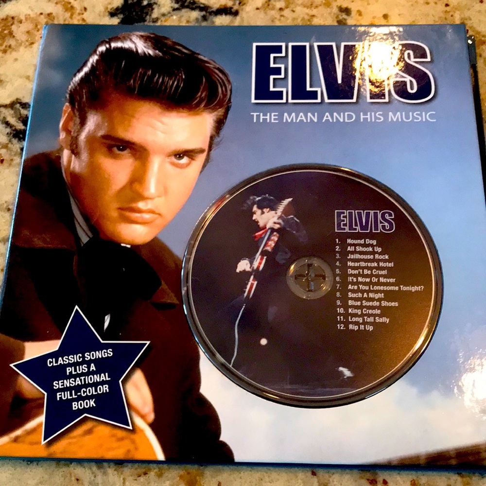 A collection for Elvis fans ! New condition with cd and book